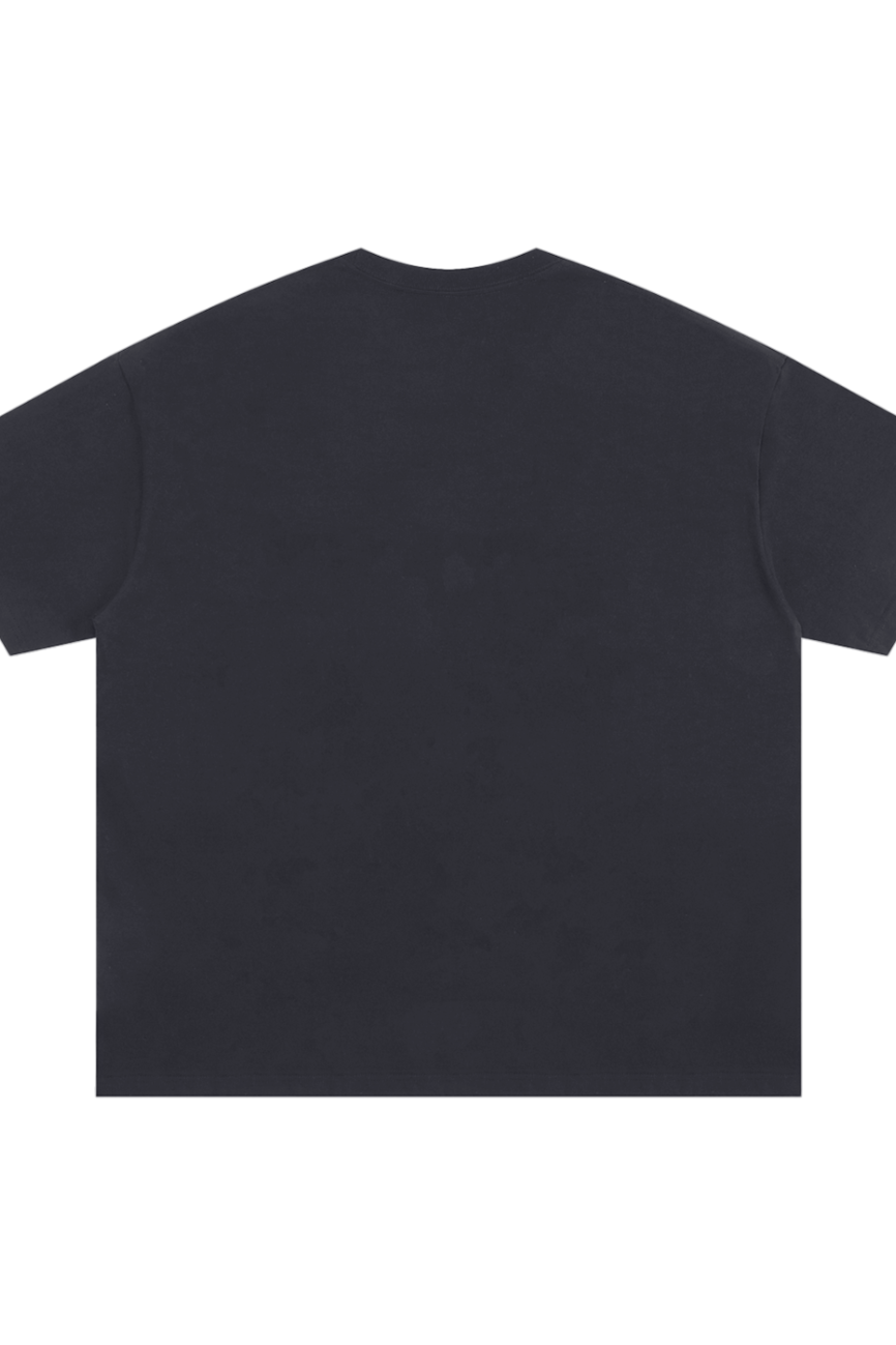 The Oversized T-shirt, an affordable luxury short-sleeve in plain black, is displayed flat with its back facing up on a white background.