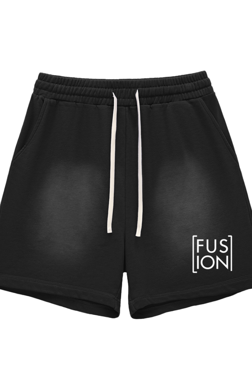 Sun Fade Raw Edge Cotton Shorts: Black shorts with white drawstrings and a white “FUSION” logo on the left leg. Featuring an elastic waistband and relaxed fit, they add affordable luxury to your everyday activewear.