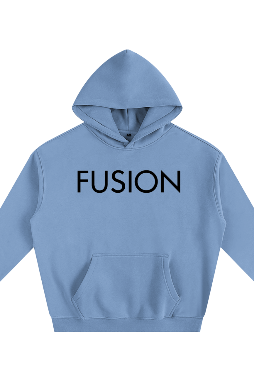 The Oversize Fleeced Hoodie is a light blue hooded sweatshirt with FUSION in bold black letters across the chest, featuring a front pocket and long sleeves for comfort and style—an affordable luxury clothing piece.