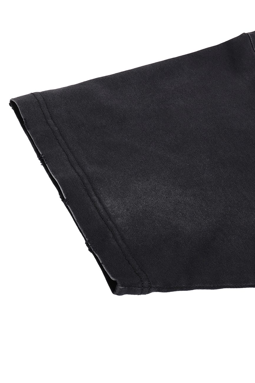 Close-up of the Fusion Vintage Washed Hand-Frayed T-Shirt’s black short sleeve against a white background. The smooth fabric and visible hem stitching highlight the quality and unique details of this affordable luxury piece.