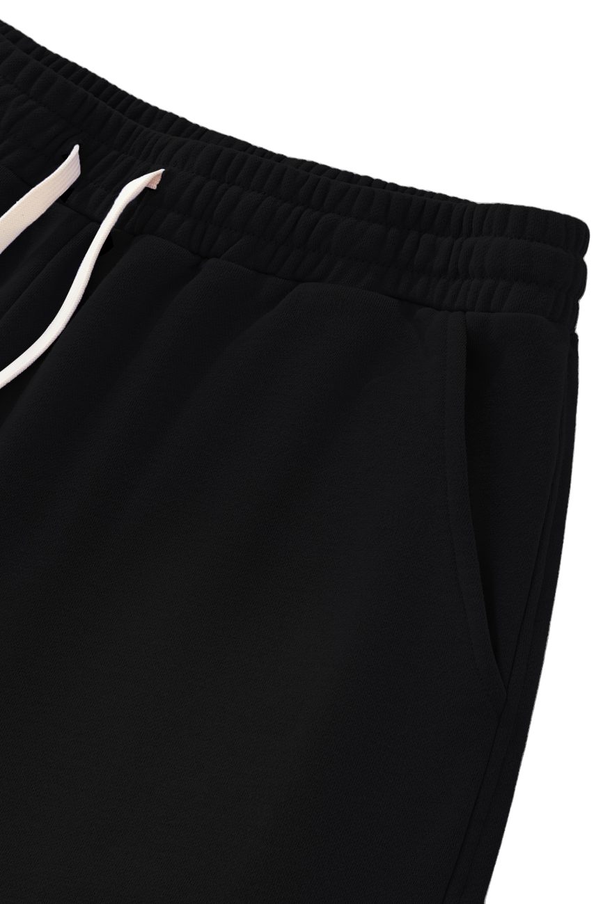 Close-up of Sun Fade Raw Edge Cotton Shorts with elastic waistband, white drawstring, and side pocket against a plain white background—an essential from our Affordable Luxury Clothing collection.