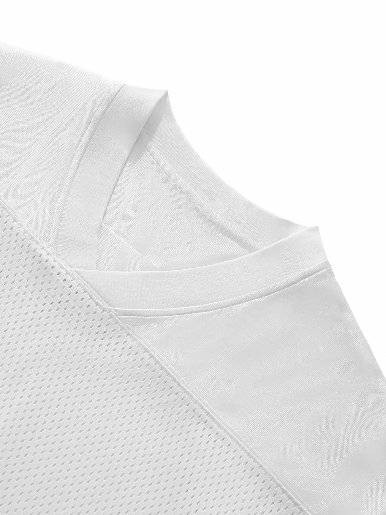 Close-up of the upper part of our Fifteen - light Taped Mesh T-Shirt, showcasing the collar, shoulder seam, and a mesh-textured section for an elevated everyday look from our Affordable Luxury Clothing line.