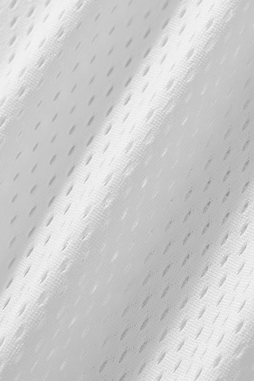 Close-up of the Fifteen - light Taped Mesh T-Shirts white, breathable fabric featuring small, evenly spaced holes and diagonal ridges—lightweight comfort and style ideal for affordable luxury sportswear or activewear.