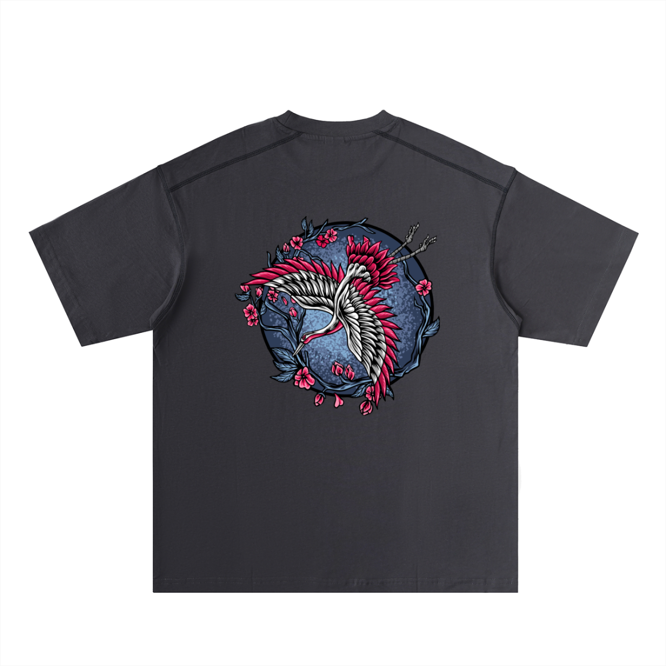 The Crane - Oversized Contrast-Stitched Cotton Tee features a black base with a vivid back graphic of a white and red crane among pink cherry blossoms and branches, all set against a blue circular background.