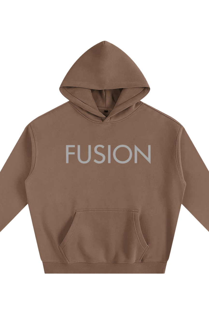 The Fusion Oversize Fleeced Hoodie features a brown color, hood, front pocket, and long sleeves. FUSION is printed in large light gray letters across the chest, offering affordable luxury and comfort for your wardrobe.