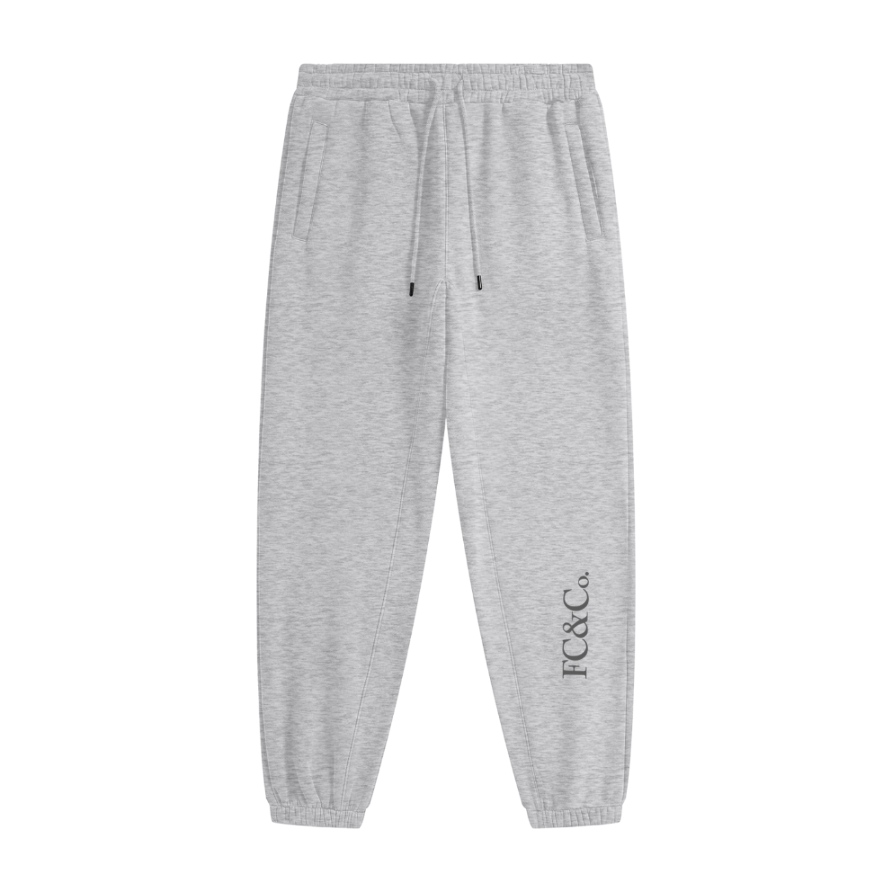 Streetwear Unisex Fleece Joggers in light gray with an elastic waistband, drawstring, and side pockets. FC&Co. is printed vertically on the left ankle—an affordable luxury piece for everyday comfort.