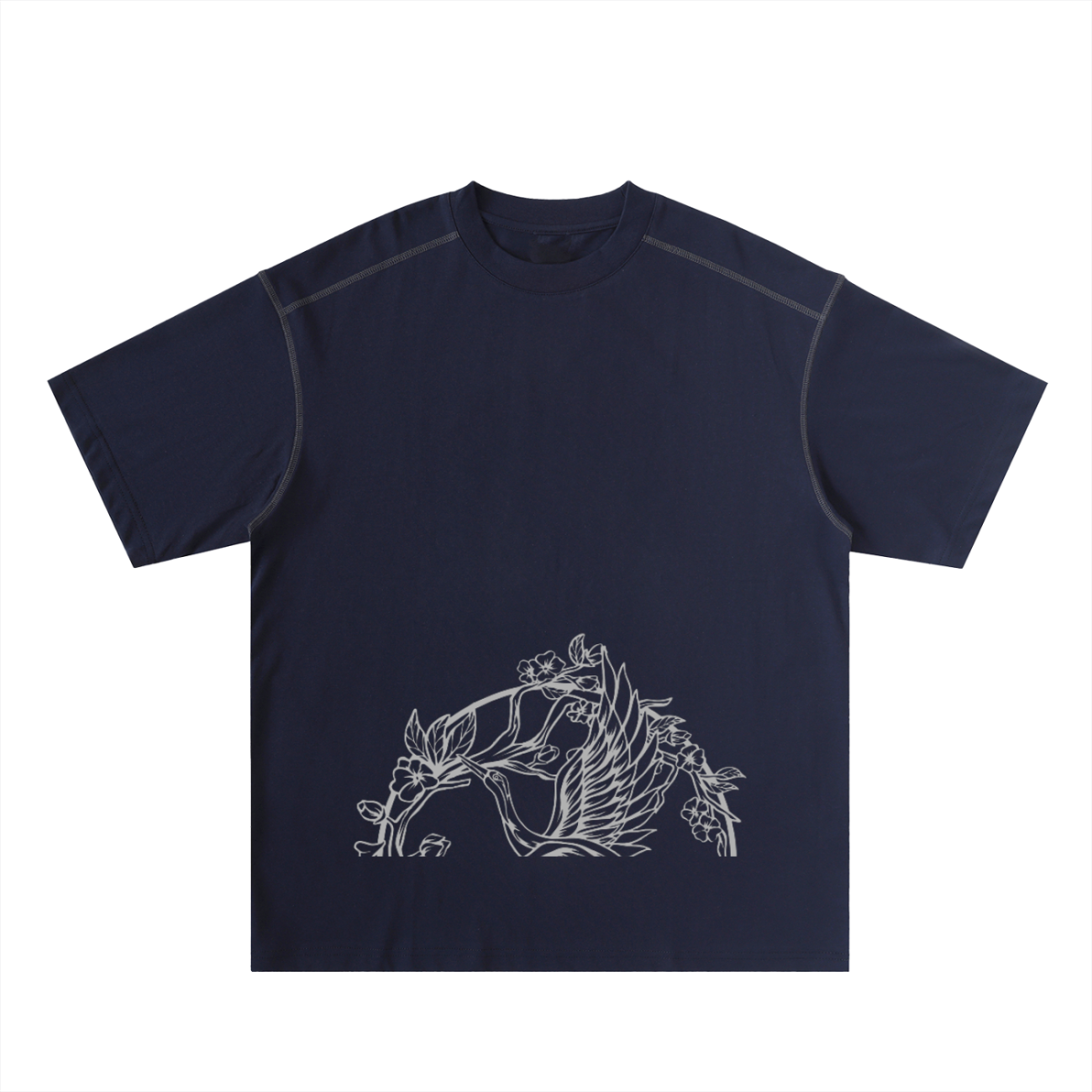 The Crane - Oversized Contrast-Stitched Cotton Tee in navy features a white minimalist line drawing of a bird, flowers, and leaves on the lower front for relaxed comfort and timeless, nature-inspired style.