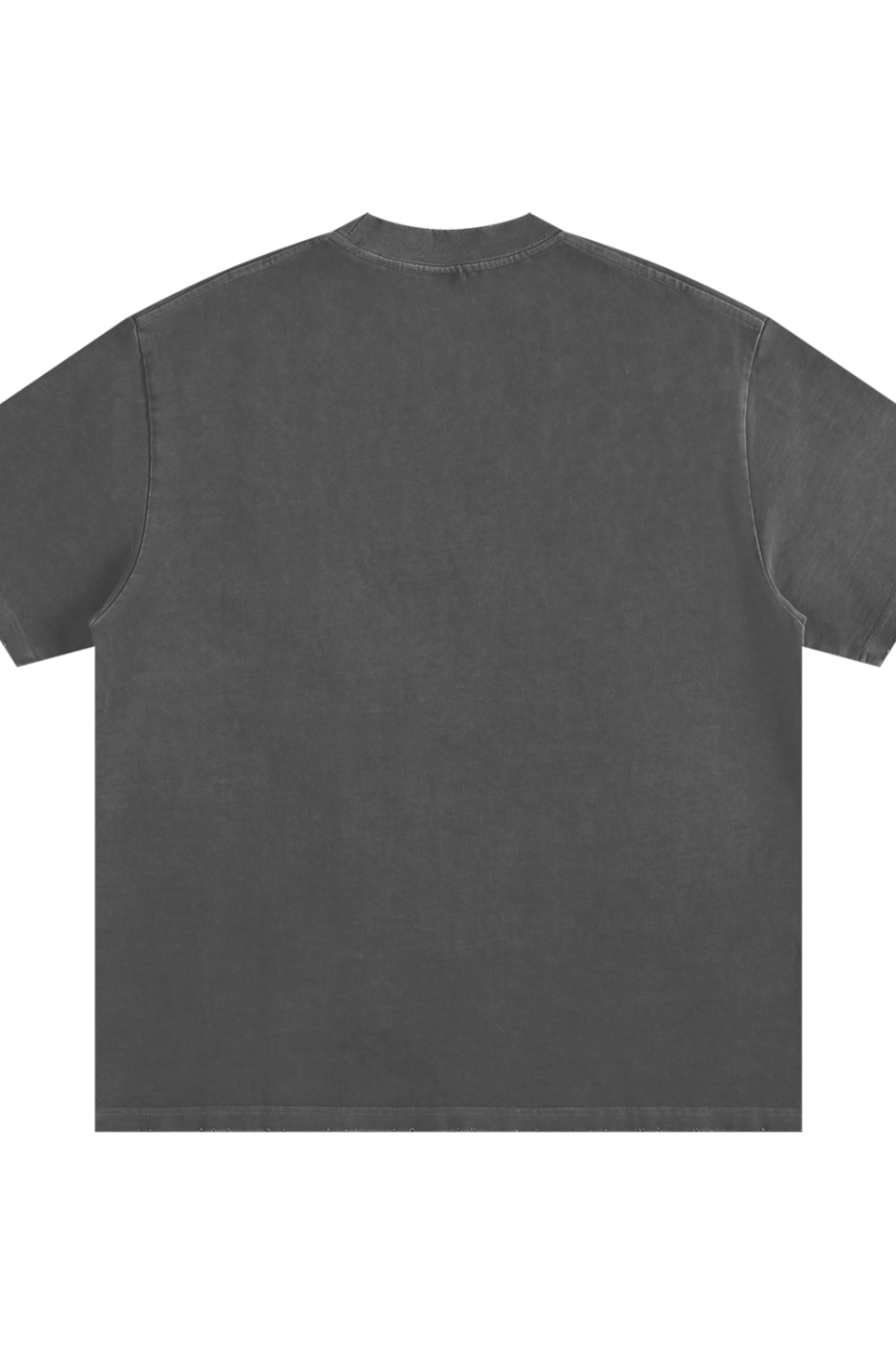 The Toile De Jouy Heavyweight Vintage Washed Frayed T-Shirt is shown from the back in dark gray against a white background—an essential piece blending vintage style with affordable luxury.