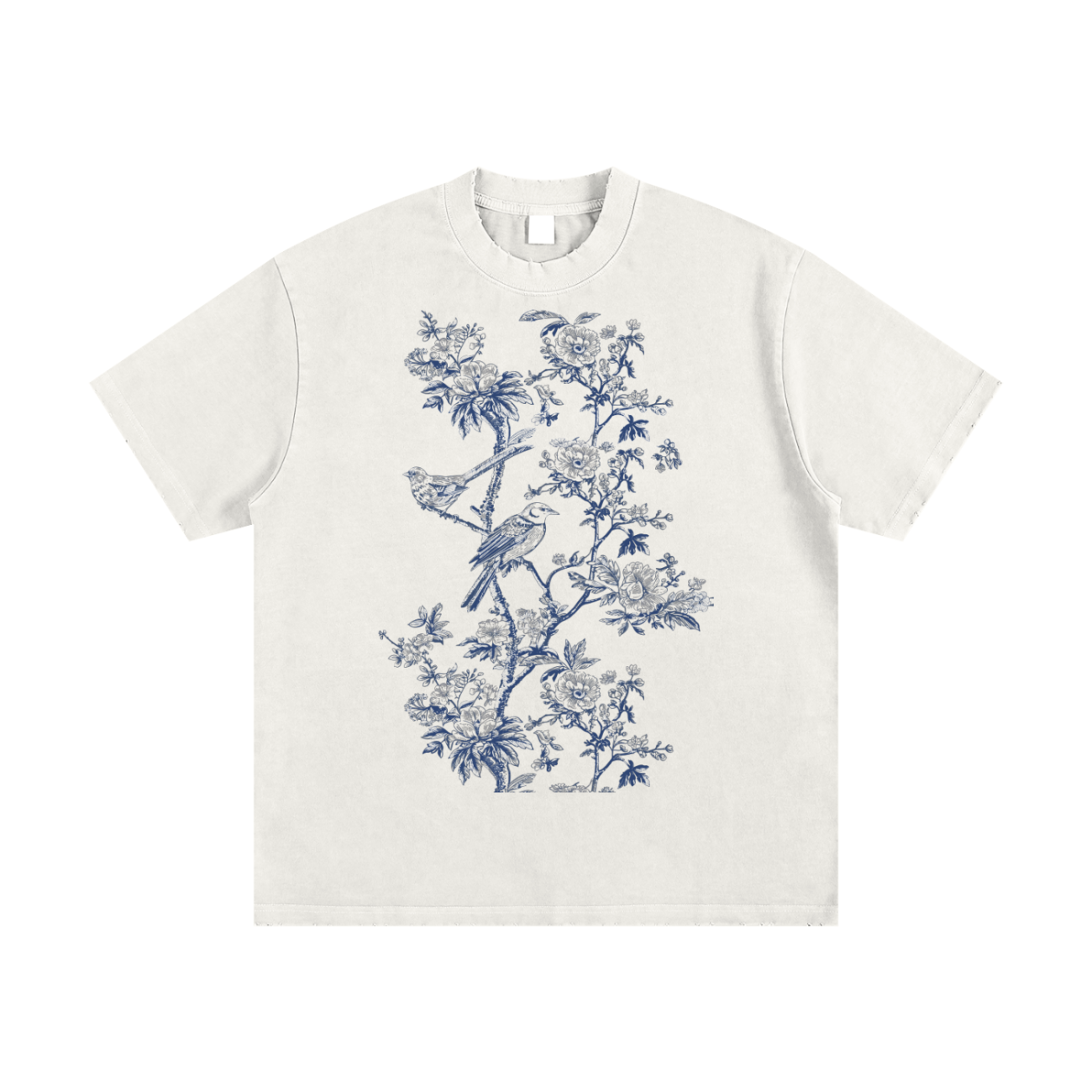 The Toile De Jouy - Heavyweight Vintage Washed Frayed T-Shirt features a detailed blue botanical and bird print on the front, combining vintage-inspired flowers and two perched birds for an affordable touch of luxury.