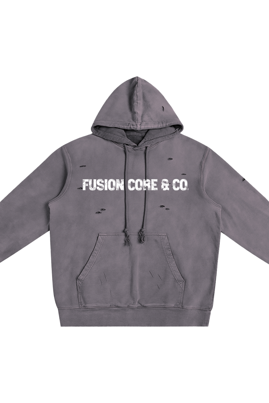 The Company Heavyweight Pure Cotton Hand-Frayed Monkey Washed Hoodie is a gray hooded sweatshirt with a front pocket and FUSION CORE & CO. in white, distressed text. This luxury piece features visible frayed spots and a vintage, monkey-washed finish.