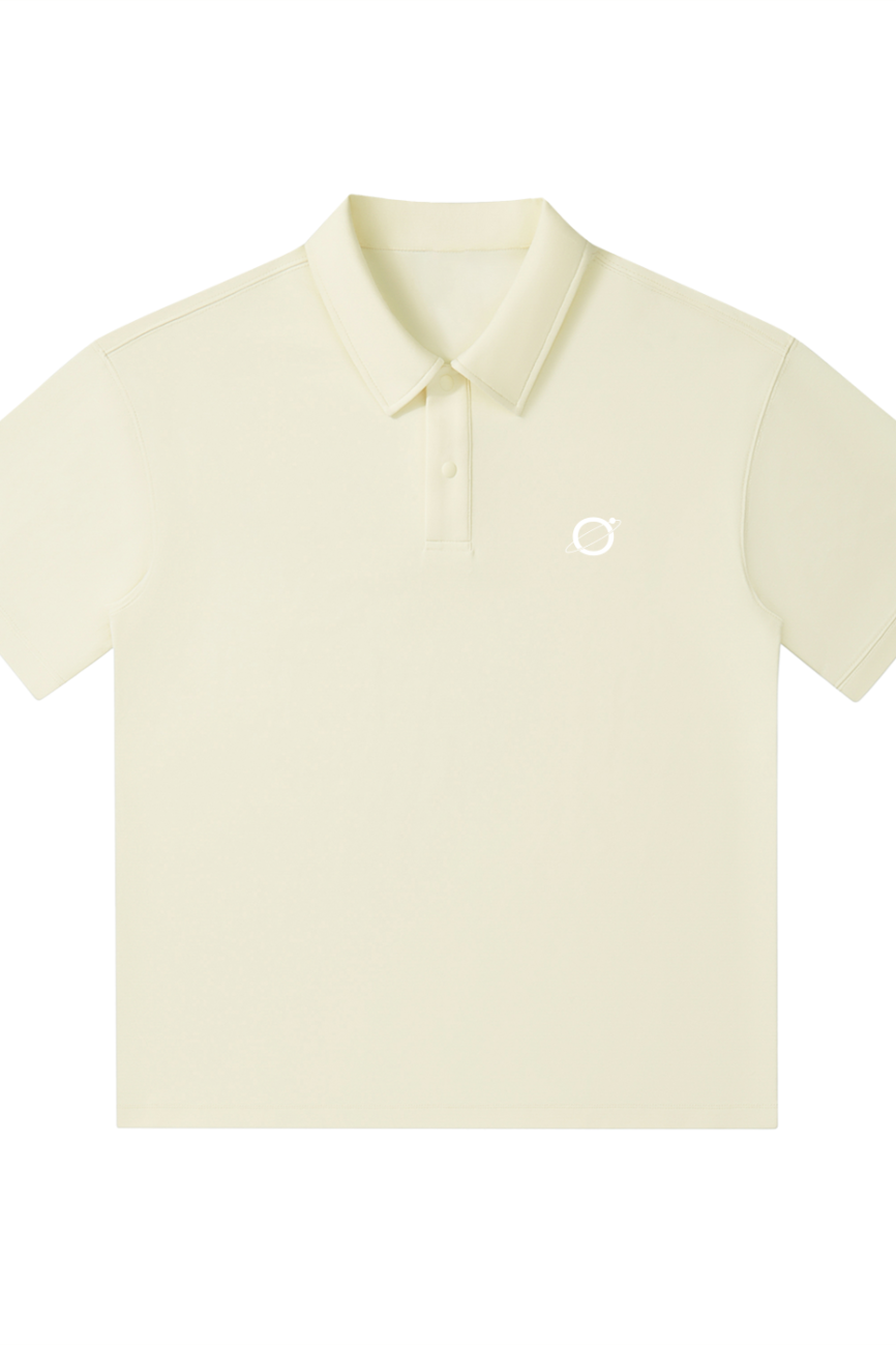 The Drop Shoulder Short-Sleeve Polo is a light yellow polo shirt with a collar, buttons, and a small white circular logo on the left chest—perfect for affordable luxury style. Displayed on a plain white background.