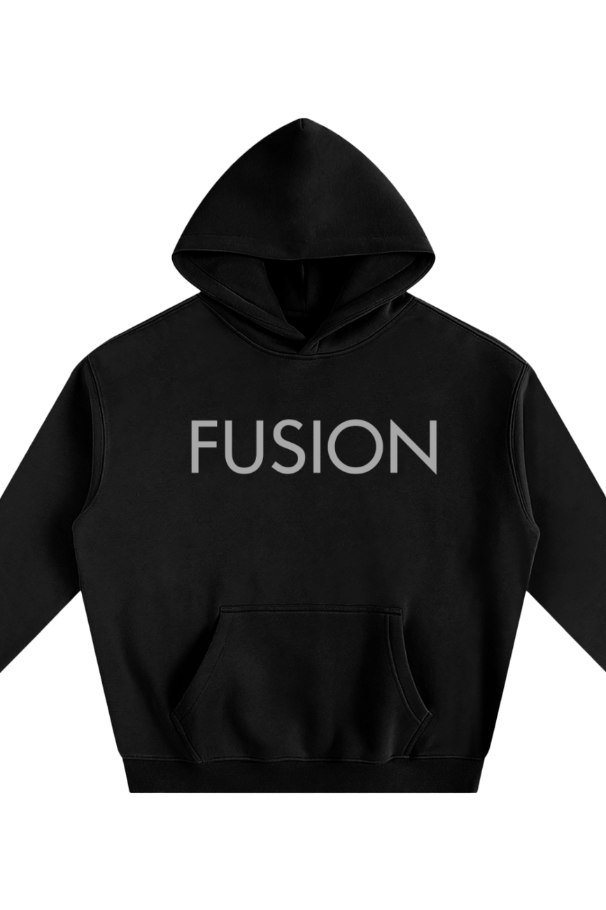 The Fusion Oversize Fleeced Hoodie is an affordable luxury essential, featuring a front pocket and FUSION boldly printed in large light gray letters across the black chest.