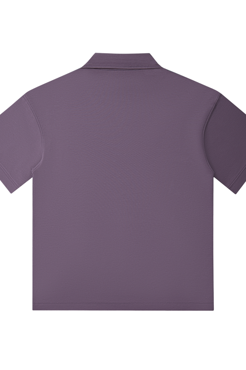 The Drop Shoulder Short-Sleeve Polo, shown from the back in muted purple against a white background, offers an affordable touch of luxury for your wardrobe.