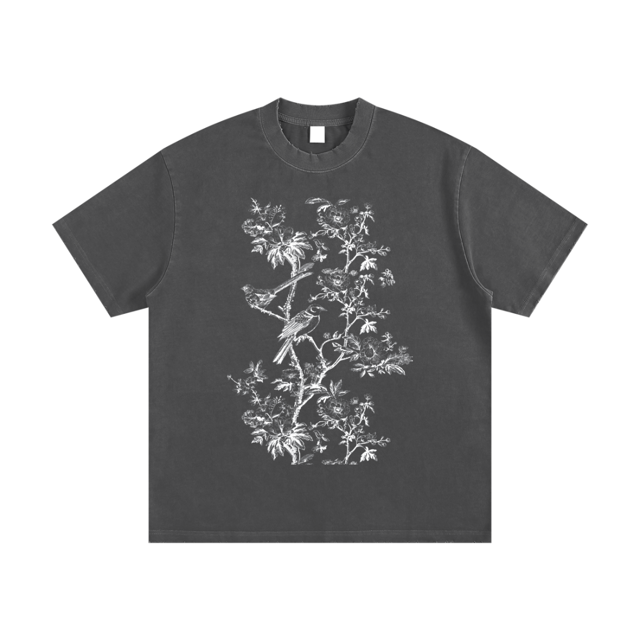 The Toile De Jouy - Heavyweight Vintage Washed Frayed T-Shirt is a black oversized tee with a detailed white line drawing of birds on leafy branches and flowers—a stylish, affordable luxury piece.