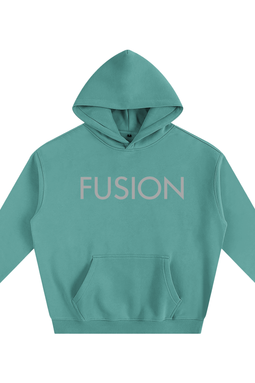 The Fusion Oversize Fleeced Hoodie features a teal color, bold light FUSION print on the chest, comfy front pocket, and long sleeves. Enjoy affordable luxury and stylish comfort for everyday wear.