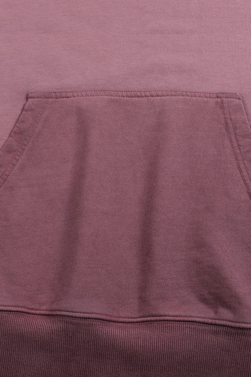 Close-up of the FC&Co. Ombre Vintage Stone Washed Colorpointed Hoodie in mauve, highlighting the front kangaroo pocket, waistband, and detailed stitching—an ideal piece for affordable luxury style.
