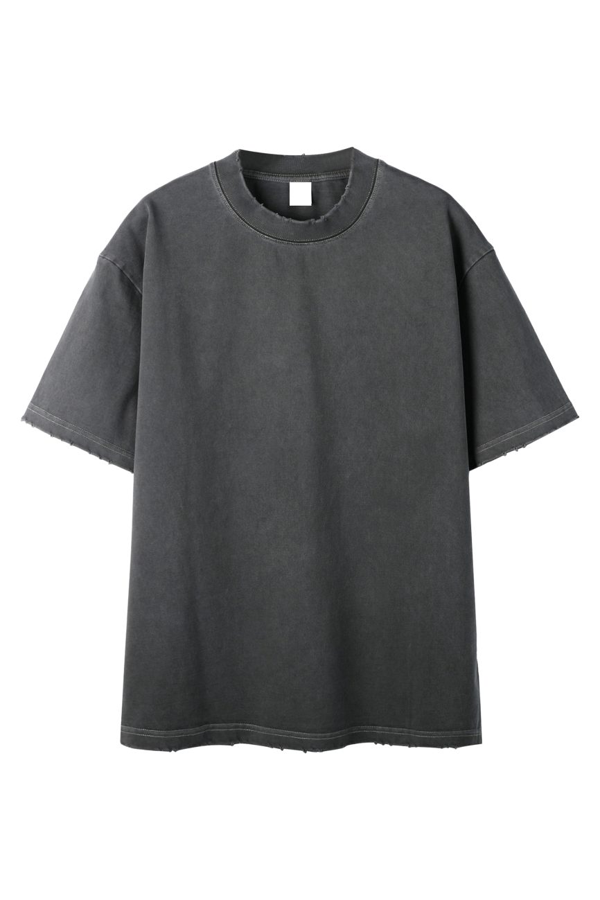 The Toile De Jouy Heavyweight Vintage Washed Frayed T-Shirt, an oversized black tee with short sleeves and a crew neck, features frayed edges and a washed finish, blending casual style with affordable luxury against a white backdrop.