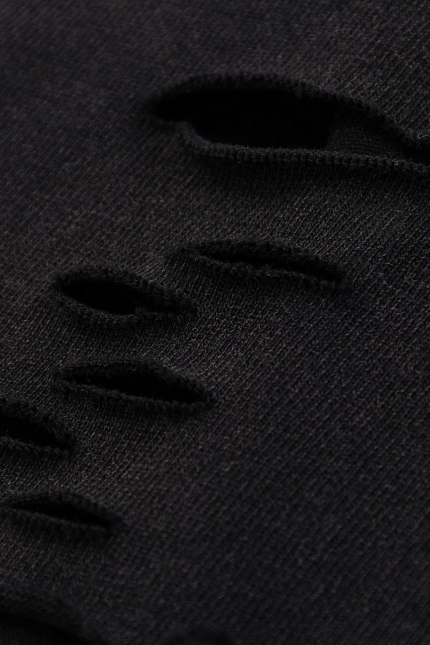 Close-up of the Fusion Snow Washed Raw-Hem T-Shirt in black, featuring horizontal rips and frayed edges for a textured, distressed look—ideal for those wanting affordable luxury with an edgy style.